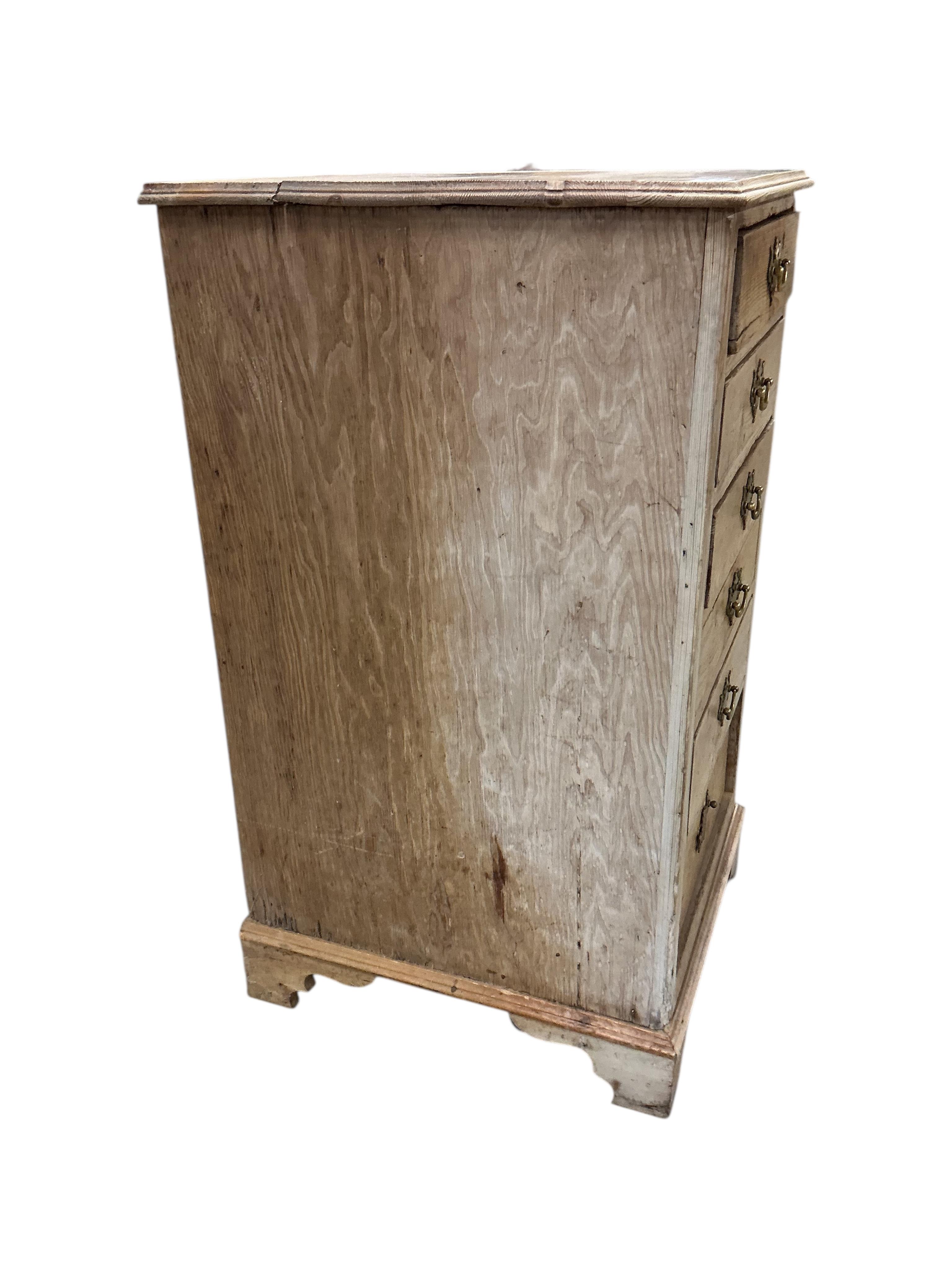 An early 19th century narrow pine chest of six drawers, width 54cm, depth 59cm, height 103cm